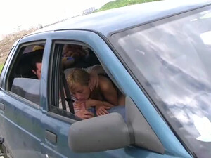 Blonde teen with perky tits is giving deep blowjob in the car